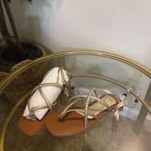 Gold sandals by Vince Camuto